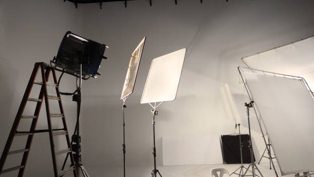 istock Studio light and back drop and soft box set up for shooting photo or video production which includes flashlight and continue lighting on tripod and paper background and used for photographer or videographer 1223456625