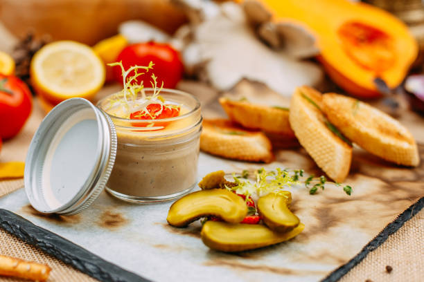 istock Autumn table setting with pumpkins. Thanksgiving dinner. Pate with breadcrumbs and pickled cucumbers 1223457019