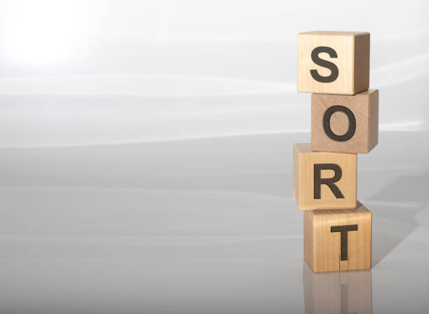 istock Recycling concept. Word SORT on cube blocks on grey glossy background with reflection. Ecology 1223466101