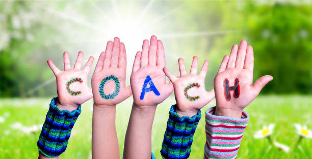 istock Children Hands Building Word Coach, Grass Meadow 1223473038