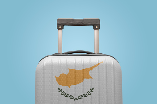 Suitcase with Cypriot flag design travel Asia concept.