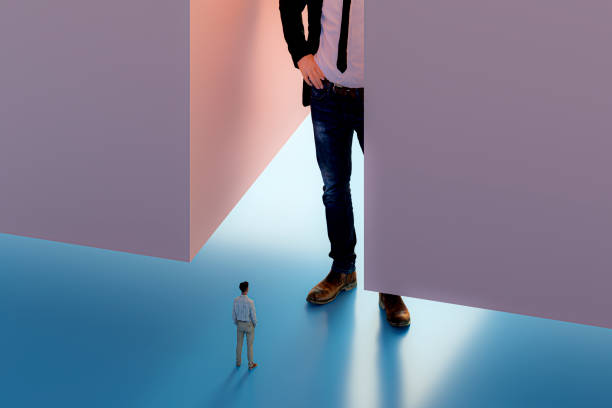 istock Businessman standing against competition 1223476498