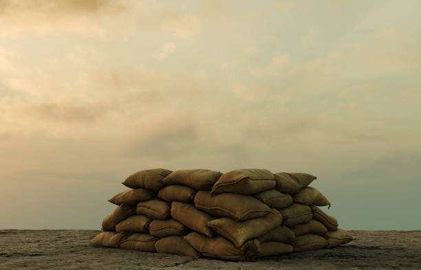 istock military sand bags against sullen sky 1223478493