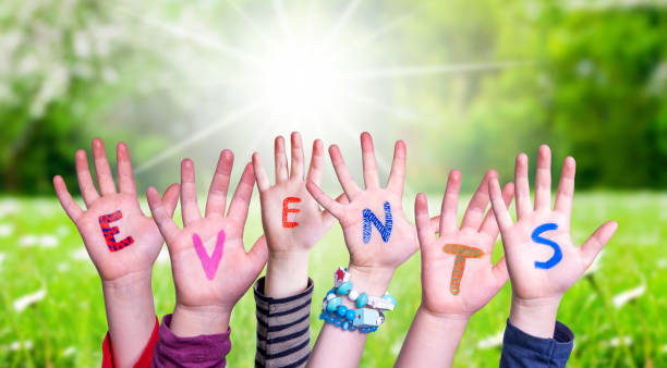 istock Many Children Hands Building Word Events, Grass Meadow 1223478676