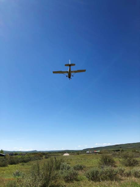 istock Small Plane Landing at a Rural Airfield 1223484385