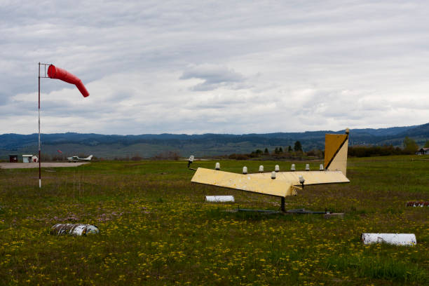 istock Mountain Airport Windsock and Wind Vane 1223486788