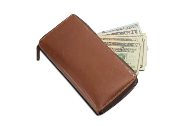 istock Brown leather wallet with US Dollar banknotes. 1223487980