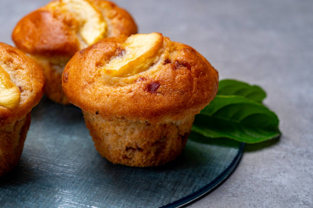 istock Fresh baked muffins with apple and cinnamon close up 1223488353