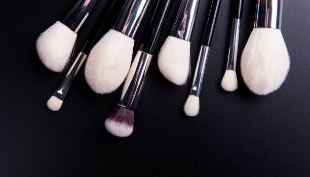 istock Make up brush lie on a black background 1223488644