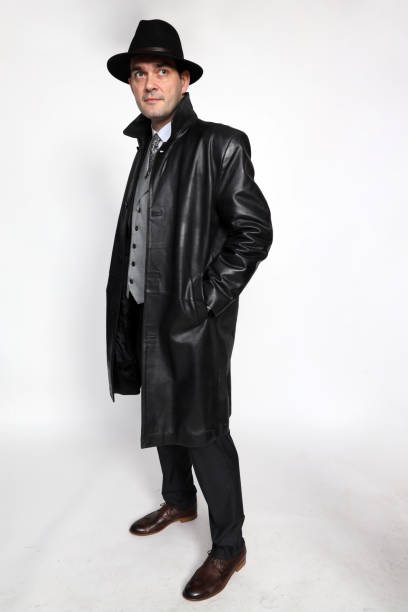 istock Handsome middle aged man posing in studio on isolated background. 1223488850
