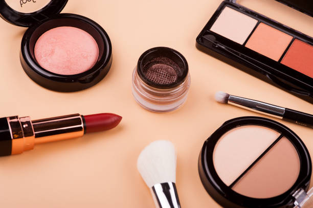 istock Cosmetic palette with brushes lies on a beige background. 1223488913