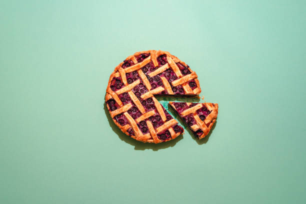 istock Blueberries pie with lattice crust top view on a green background. 1223491137