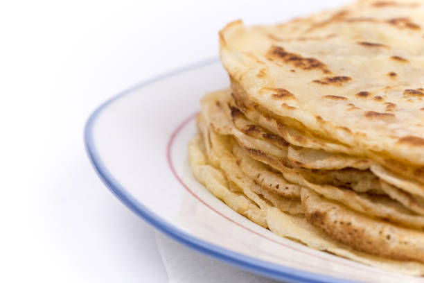 istock Homemade pancakes on the plate. Isolated on white background. 1223491442