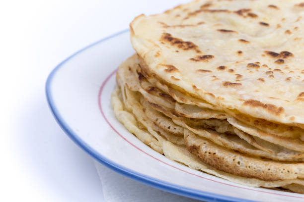 istock Homemade pancakes on the plate. Isolated on white background. 1223491453