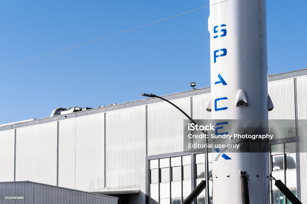 SpaceX headquarters in Hawthorne, California Dec 8, 2019 Hawthorne / Los Angeles / CA / USA - SpaceX (Space Exploration Technologies Corp.) headquarters; Falcon 9 rocket displayed in the front; SpaceX is a private American aerospace manufacturer SpaceX Stock Photo