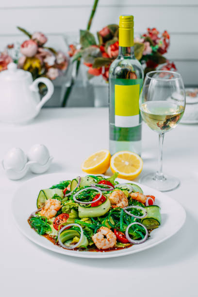 istock fresh vegetable salad with shrimp, healthy eating isolated on white background 1223492646