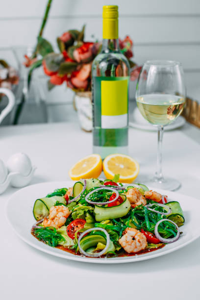 istock fresh vegetable salad with shrimp, healthy eating isolated on white background 1223492686