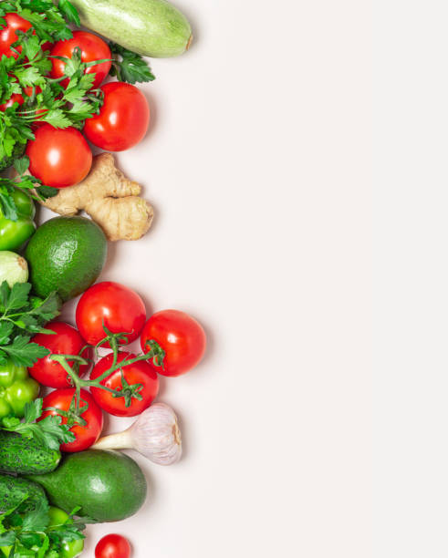 istock Fresh green and red vegetables on a light background, top view 1223492971