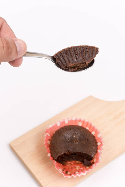 istock Slice of chocolate muffin on the spoon 1223498595