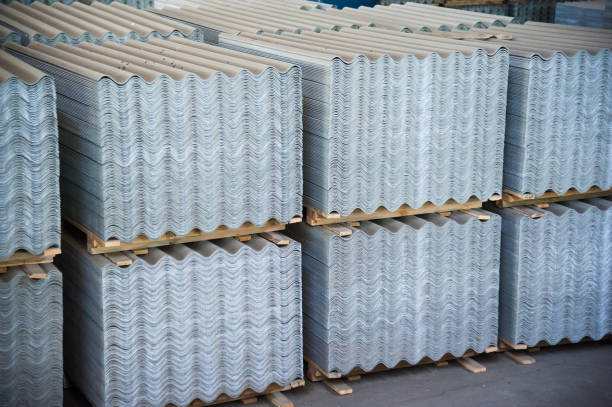 Asbestos roof. Asbestos cement roofing sheets, corrugated panels, stacked.