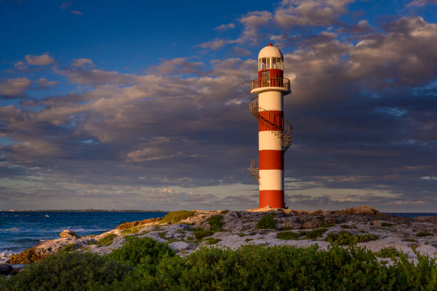 istock Lighthouse at sunset in twilight in clear weather 1223505555