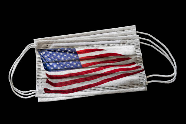 istock Surgical Masks With US American Flag Printed Isolated on Black Background 1223506364
