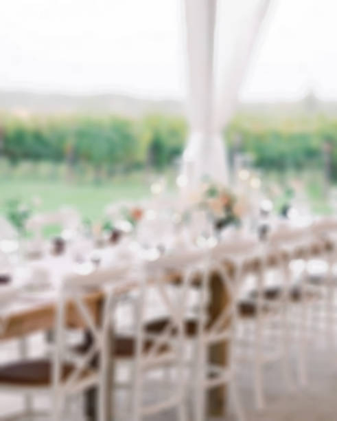 istock Blurry view of Wedding table set for dining.suitable for wedding background. 1223506499