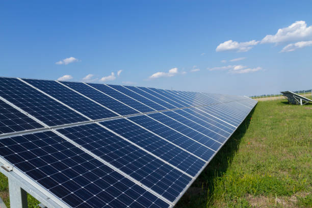 istock Photovoltaic modules reflect sunset light and clouds 1223506859