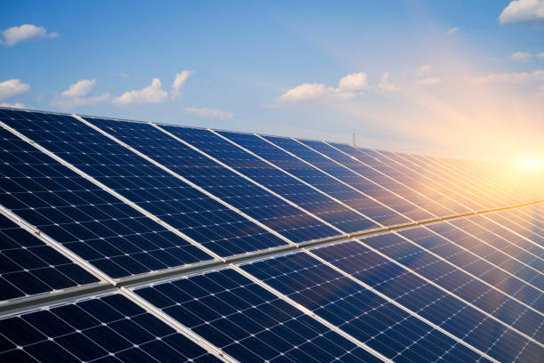 istock Photovoltaic modules reflect sunset light and clouds 1223506861