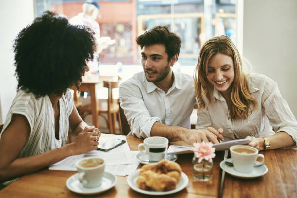 istock Business Colleagues Brainstorming During Cafe Coffee Break 1223507474