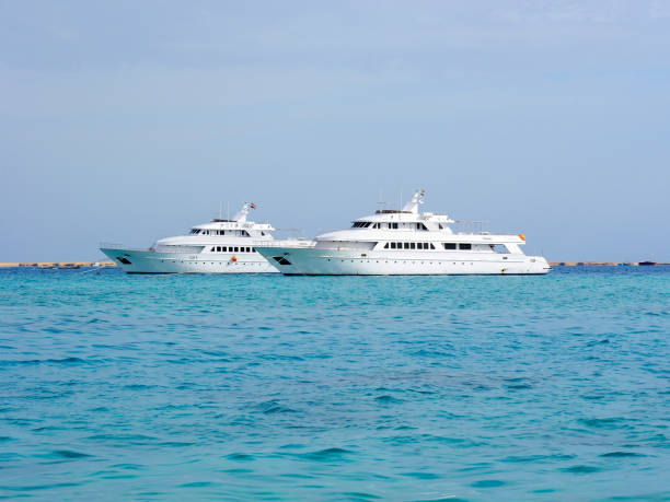 istock Yachts sailing on azure sea water 1223507856