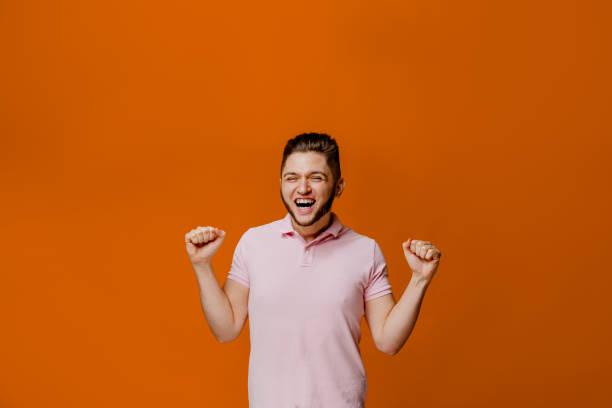 istock Funny handsome man fools around. Shouting loud 