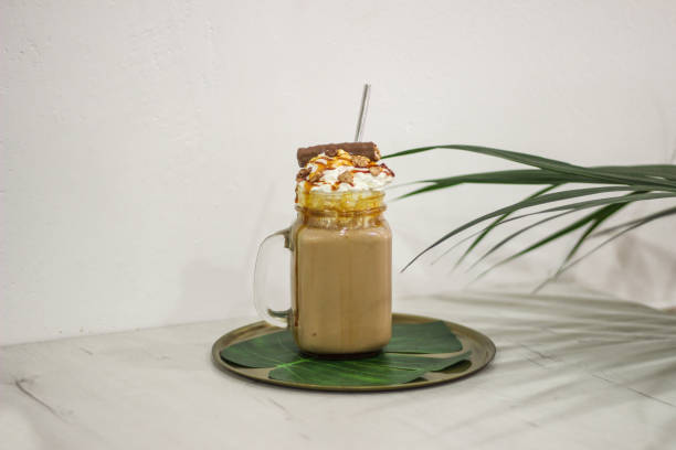 istock Milkshake caramel, biscuit, whipped cream with metal straw 1223511738
