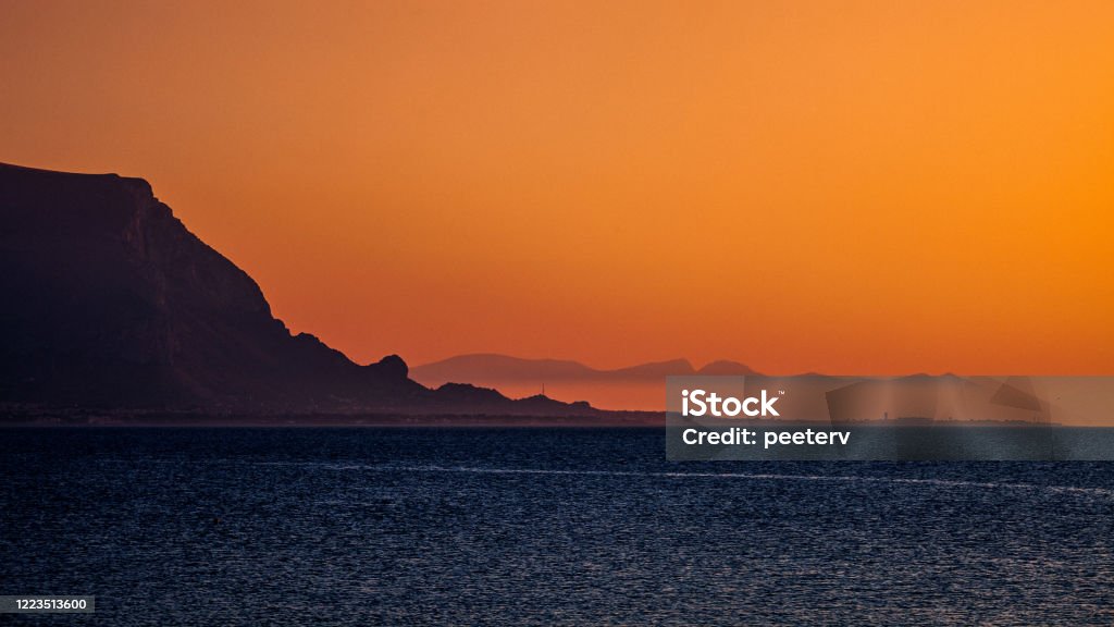 Mediterranean sunset - Sicily Mediterranean sunset. Palermo, Sicily, Italy Back Lit Stock Photo