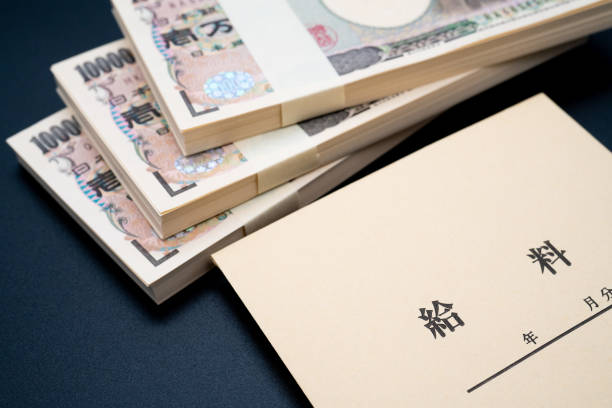 istock Salary bag and wad 1223519672