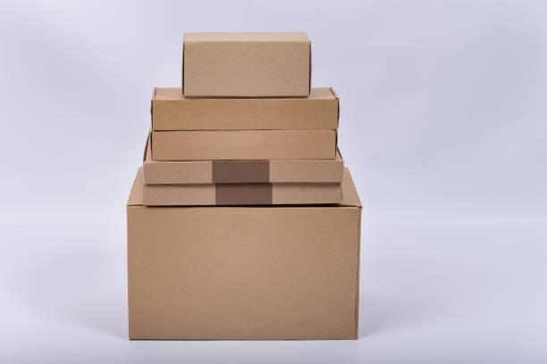 istock Some cardboard boxes are on each other on white background. 1223519993