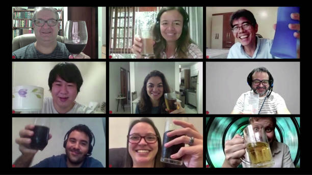 Computer screen layout with friends in a Happy Hour together and talking on a conference call Great example of how technology can facilitate social distance during crises that require staying at home. Case of during pandemic isolation by COVID-19. Friends drinking and toasting in a happy meeting by computer. window grid patterns stock pictures, royalty-free photos & images