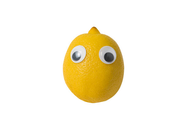 istock Lemon with eyes isolated on white background. Food with Funny Faces. 1223522738