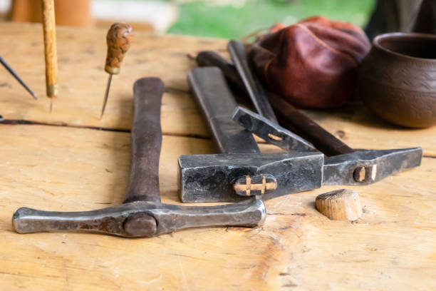 istock three working tools an old and shabby hammer and pickaxe lies on a rustic table 1223523578