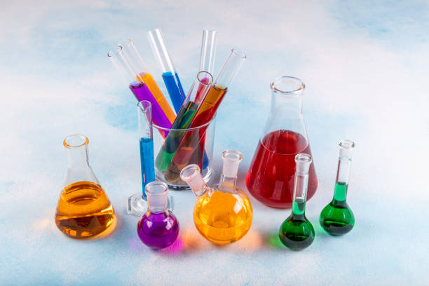 istock Different laboratory glassware with color liquid. 1223526660