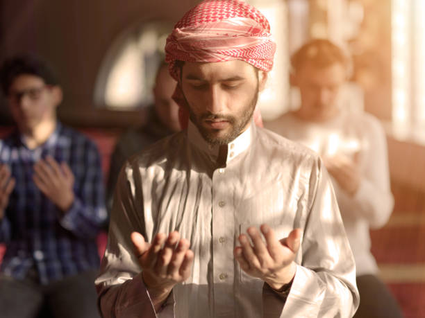 istock muslim people praying in mosque 1223528905