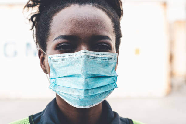 istock Factory workers with face mask protect from outbreak of Coronavirus COVID-19 1223541316