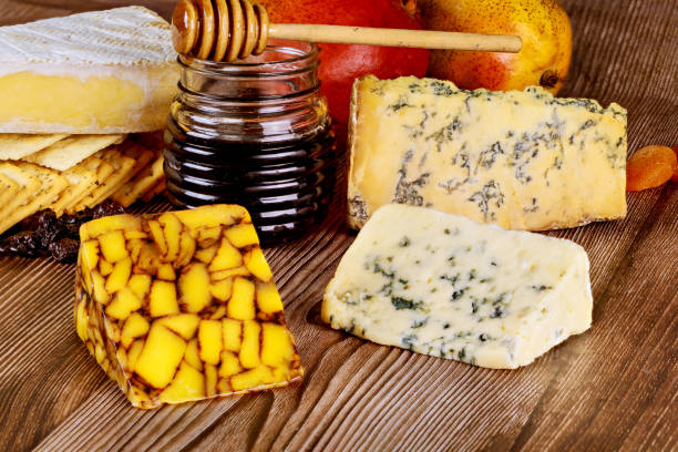 istock Honey and different type of cheese. 1223544001