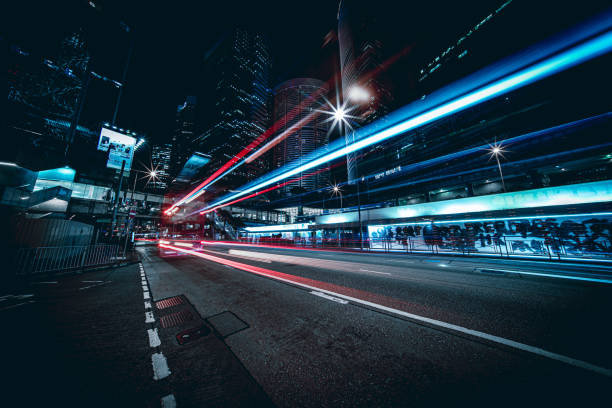 istock Illuminated Skyscrapers and light trails in Hong Kong 1223545681