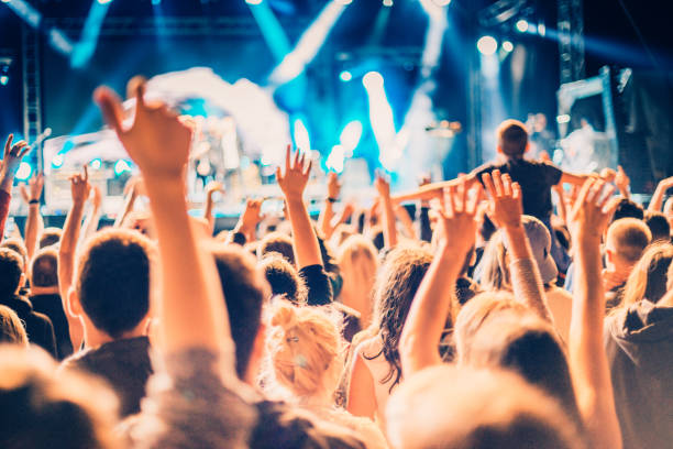 istock cheering crowd at rock concert 1223548123