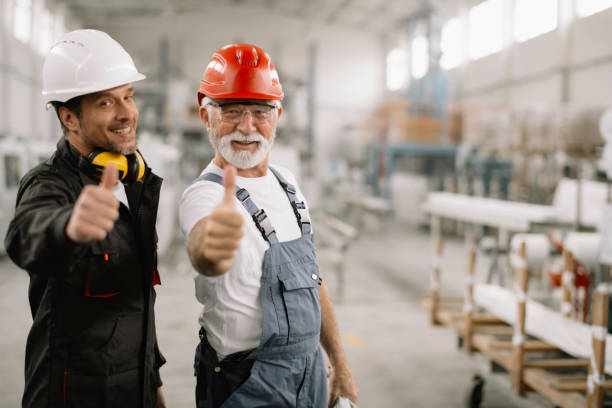 istock Colleagues showing thumbs up. 1223549991