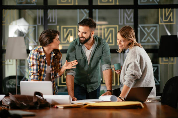istock Colleagues working together in office. 1223550015