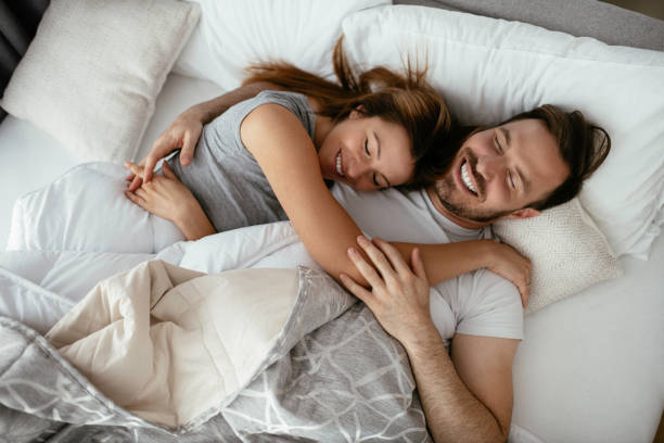 istock Young loving couple in bed. 1223550397