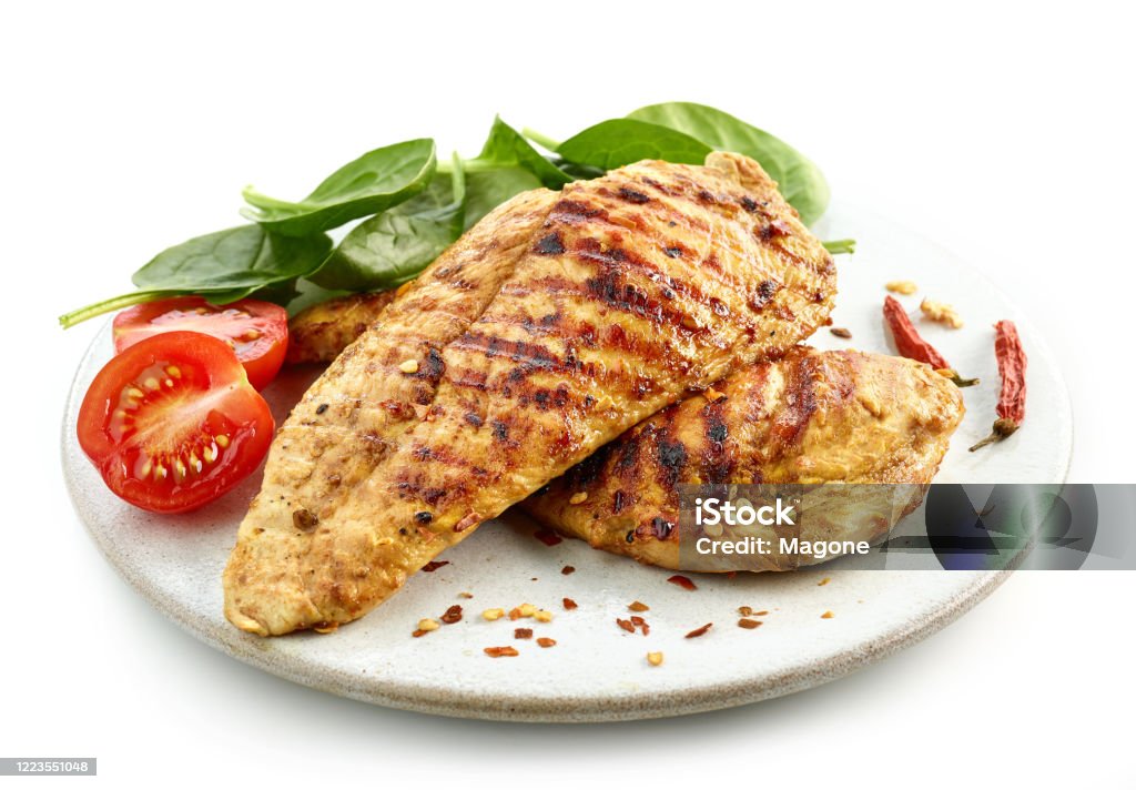 grilled chicken fillet meat grilled chicken fillet on white plate isolated on white background Chicken Breast Stock Photo