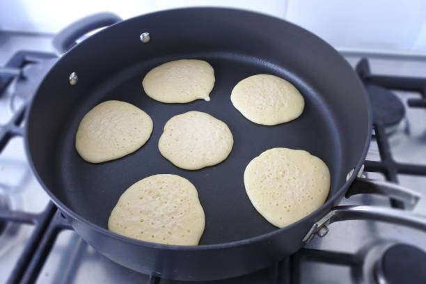 Frying Pikelets in a fry pan